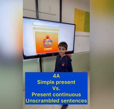 In class 4A, students practiced the difference between present continuous with simple present by playing a game through unscrambling sentences